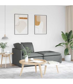 Sofá modular con reposapiés y cojines de tela gris oscuro